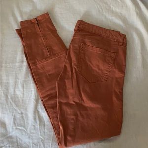 Dark orange skinny jeans